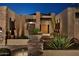 Stunning desert home with stone accents and mature landscaping at 28492 N 95Th Pl, Scottsdale, AZ 85262