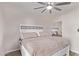 Bright bedroom with a king-size bed and ceiling fan at 2929 W Yorkshire Dr # 1118, Phoenix, AZ 85027