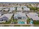 Beautiful aerial shot of home featuring a pool, landscaping, neighborhood, solar panels, and outdoor amenities at 2967 E Boot Track Trl, Gilbert, AZ 85296