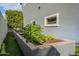 Raised garden beds with thriving plants, adding a touch of nature and sustainability to the property's landscape at 2967 E Boot Track Trl, Gilbert, AZ 85296