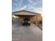 Newly constructed home with carport and front yard at 3133 W Polk St, Phoenix, AZ 85009