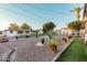 Backyard view showing a large gravel area with plants at 410 N 56Th Pl, Mesa, AZ 85205