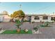 Spacious backyard with gravel, plants, and a shed at 410 N 56Th Pl, Mesa, AZ 85205