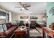 Living room with comfortable seating and large windows at 410 N 56Th Pl, Mesa, AZ 85205