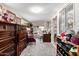 Home office features built-in shelving and plenty of natural light at 410 N 56Th Pl, Mesa, AZ 85205