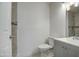 Updated bathroom with gray vanity and tiled shower at 4242 N 69Th Dr # 1303, Phoenix, AZ 85033