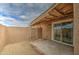 Private patio with covered area and sliding door access at 4242 N 69Th Dr # 1303, Phoenix, AZ 85033