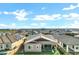 Aerial view of backyard featuring an extended covered patio, privacy fence, and low-maintenance synthetic grass at 4342 E Sagebrush St, Gilbert, AZ 85296