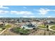 Aerial view of neighborhood and community pool with clubhouse, playground, and outdoor recreation areas at 4342 E Sagebrush St, Gilbert, AZ 85296