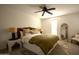 Inviting bedroom with a wicker headboard, soft lighting, patterned rug, and neutral décor at 4354 N 82Nd St # 137, Scottsdale, AZ 85251