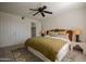 Bright bedroom featuring neutral colored decor, carpeted floors, ceiling fan, and natural lighting at 4354 N 82Nd St # 137, Scottsdale, AZ 85251