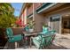 Cozy outdoor patio with a table and chairs, perfect for relaxing and enjoying the scenery at 4354 N 82Nd St # 137, Scottsdale, AZ 85251