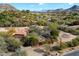 Aerial view of single-story home with mountain views at 4510 E Pepper Tree Ln, Paradise Valley, AZ 85253