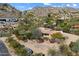 Aerial view of single-story home nestled in landscape at 4510 E Pepper Tree Ln, Paradise Valley, AZ 85253