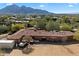 Aerial view of single-story home with mountain views at 4510 E Pepper Tree Ln, Paradise Valley, AZ 85253