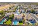 Beautiful aerial view of a landscaped property with a sparkling pool and lush lawn at 476 E Atlantic Dr, Casa Grande, AZ 85122