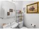 Elegant powder room boasts decor and fixtures at 476 E Atlantic Dr, Casa Grande, AZ 85122