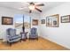 The bedroom features two armchairs, a small round table, and wall decorations at 476 E Atlantic Dr, Casa Grande, AZ 85122