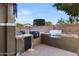 Outdoor kitchen complete with a built-in grill and sink at 476 E Atlantic Dr, Casa Grande, AZ 85122