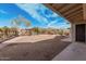 Large backyard with desert landscape and potential for customization with mountain views at 50031 N 27Th Ave, New River, AZ 85087