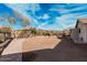 Large backyard with desert landscape and potential for customization with mountain views at 50031 N 27Th Ave, New River, AZ 85087