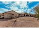 Expansive backyard featuring desert landscaping, gravel and mountain views in the distance at 50031 N 27Th Ave, New River, AZ 85087