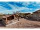 Property with outbuildings and plenty of room for animals with desert landscaping at 50031 N 27Th Ave, New River, AZ 85087