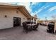 Outdoor patio with stone flooring, built in bar and seating area with mountain views at 50031 N 27Th Ave, New River, AZ 85087