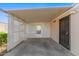 Covered patio with lattice walls and a door at 5807 E Leonora St, Mesa, AZ 85215