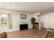 Living room with hardwood floors and built-in shelving at 5807 E Leonora St, Mesa, AZ 85215