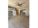 Open concept kitchen with tile floors and white appliances at 6039 N 73Rd Ave, Glendale, AZ 85303