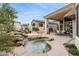 Outdoor living with a private backyard oasis with spa, outdoor fireplace and covered patio at 7705 E Doubletree Ranch Rd # 56, Scottsdale, AZ 85258