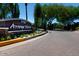 Elegant community entrance sign surrounded by beautiful landscaping and trees at 7705 E Doubletree Ranch Rd # 56, Scottsdale, AZ 85258