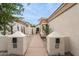 Inviting front walkway leading to the home, enhanced by well-maintained landscaping at 7705 E Doubletree Ranch Rd # 56, Scottsdale, AZ 85258