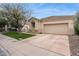 Stunning front exterior showcasing a well-maintained lawn and convenient two-car garage, on a sunny day at 7705 E Doubletree Ranch Rd # 56, Scottsdale, AZ 85258