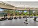 Fitness center equipped with modern cardio machines, floor to ceiling windows and scenic outdoor views at 7705 E Doubletree Ranch Rd # 56, Scottsdale, AZ 85258