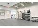 Well-equipped gym features free weights and strength training equipment near a kitchenette and lounge at 7705 E Doubletree Ranch Rd # 56, Scottsdale, AZ 85258