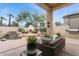 Inviting backyard featuring a fireplace, in-ground spa and comfortable outdoor seating area at 7705 E Doubletree Ranch Rd # 56, Scottsdale, AZ 85258