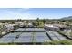 A high angle shot of the community tennis courts, with the community center in the background at 7705 E Doubletree Ranch Rd # 56, Scottsdale, AZ 85258