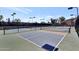 An eye-level shot of the community tennis and pickleball courts on a bright day at 7705 E Doubletree Ranch Rd # 56, Scottsdale, AZ 85258