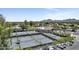 Aerial view of tennis courts, showcasing a pristine sports facility with surrounding lush greenery at 7705 E Doubletree Ranch Rd # 56, Scottsdale, AZ 85258