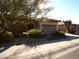 Single-story home with desert landscaping and two-car garage at 7741 E Balao Dr, Scottsdale, AZ 85266