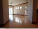 Hardwood floors and high ceilings in spacious living room at 7741 E Balao Dr, Scottsdale, AZ 85266