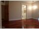 Elegant living room with hardwood floors and a view of the bathroom at 7741 E Balao Dr, Scottsdale, AZ 85266