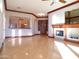 Bright living room with hardwood floors and views to kitchen and entry at 7741 E Balao Dr, Scottsdale, AZ 85266