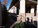 Side yard with stone pathway and desert landscaping at 7741 E Balao Dr, Scottsdale, AZ 85266