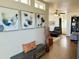 Inviting hallway with a decorative bench and modern art at 7750 E Broadway Rd # 400, Mesa, AZ 85208