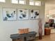 Inviting hallway with a decorative bench and modern art at 7750 E Broadway Rd # 400, Mesa, AZ 85208