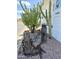 Landscaping with rocks, cactus, wood and a rusty chain near the Casa Mesa home at 7750 E Broadway Rd # 400, Mesa, AZ 85208