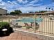 Fenced pool area with lounge chairs, offering a refreshing retreat on sunny days at 7750 E Broadway Rd # 400, Mesa, AZ 85208